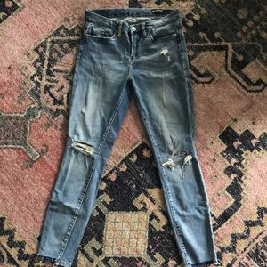 Super cute stretch jeans. Very comfy. Cute hem on jeans. Ankle length 5’4”
